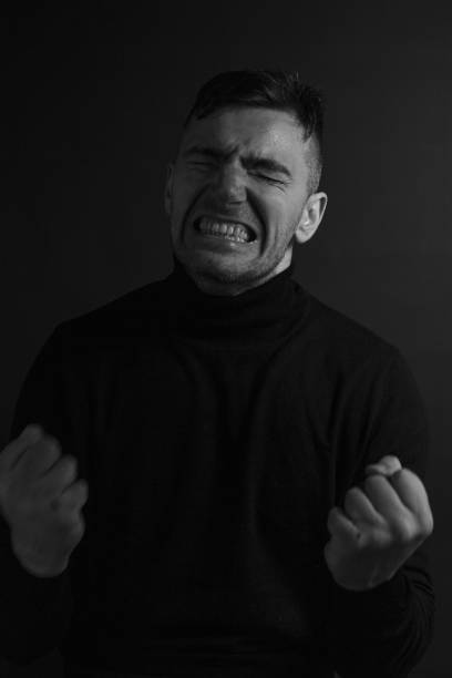 istock Black and White Emotional Portrait Young Man 1217968279