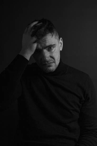 istock Black and White Emotional Portrait Young Man 1217968291