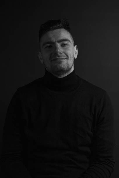 istock Black and White Emotional Portrait Young Man 1217968301