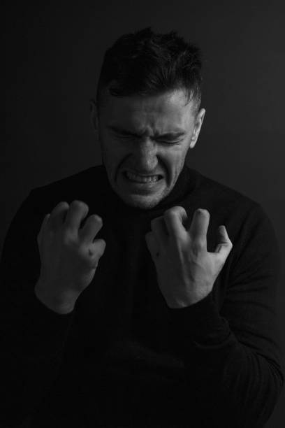 istock Black and White Emotional Portrait Young Man 1217968303