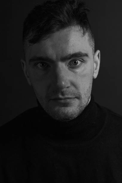 istock Black and White Emotional Portrait Young Man 1217968305