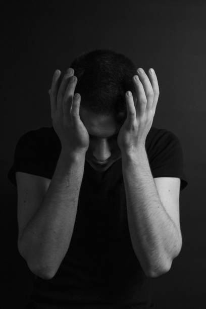 istock Black and White Emotional Portrait Young Man 1217969260