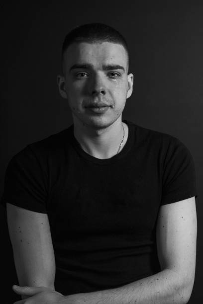 istock Black and White Emotional Portrait Young Man 1217969276