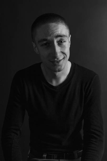 istock Black and White Emotional Portrait Young Man 1217969435