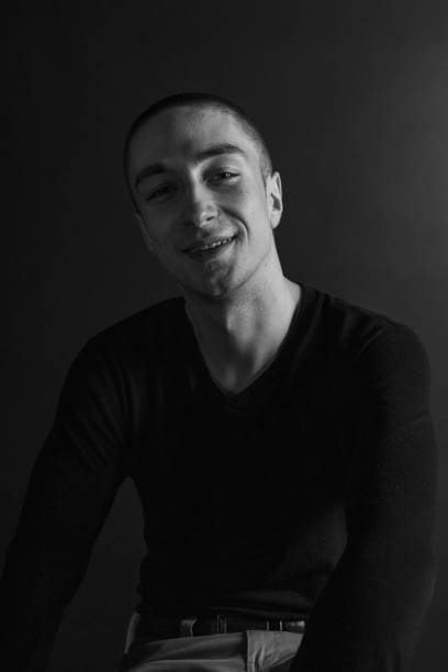 istock Black and White Emotional Portrait Young Man 1217969451