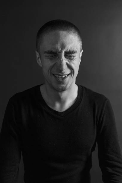 istock Black and White Emotional Portrait Young Man 1217969495