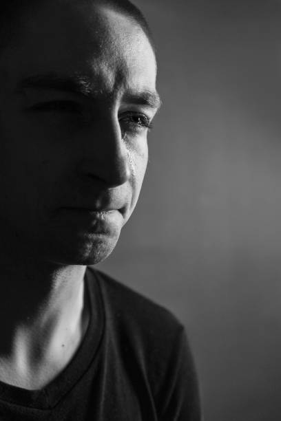 istock Black and White Emotional Portrait Young Man 1217969513