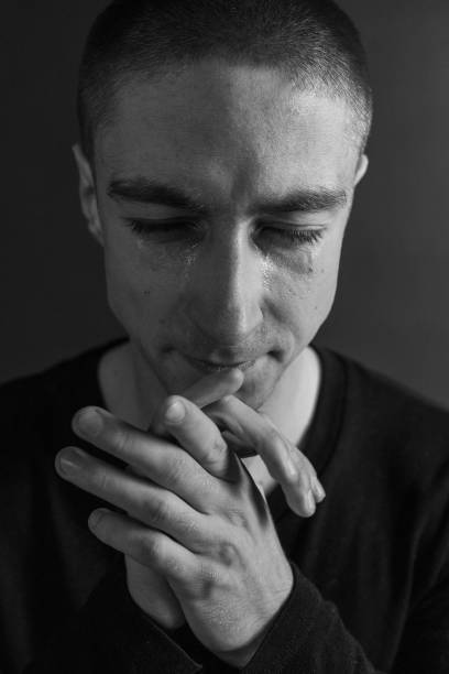 istock Black and White Emotional Portrait Young Man 1217969520