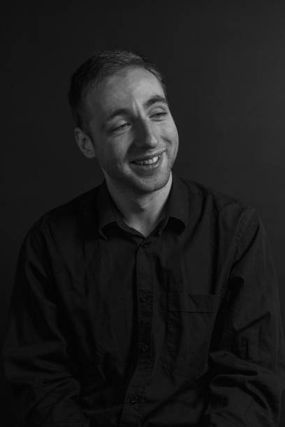 istock Black and White Emotional Portrait Young Man 1217969950