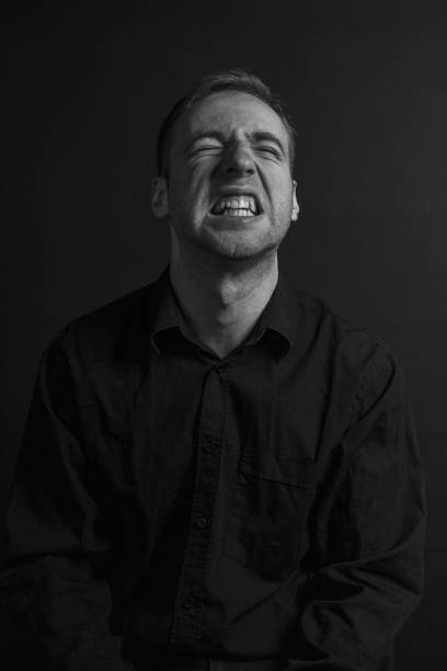 istock Black and White Emotional Portrait Young Man 1217969990