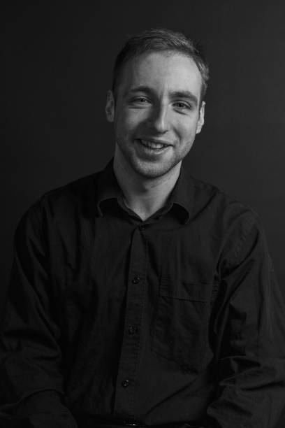istock Black and White Emotional Portrait Young Man 1217969991