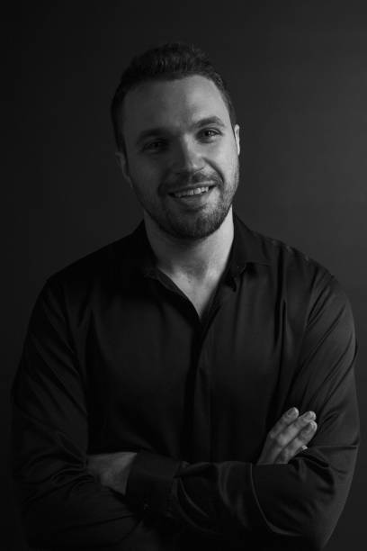 istock Black and White Emotional Portrait Young Man 1217970136