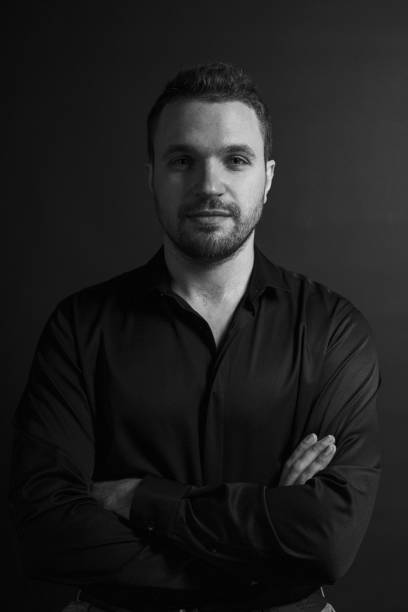 istock Black and White Emotional Portrait Young Man 1217970150