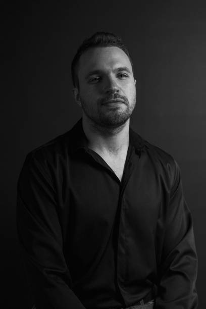 istock Black and White Emotional Portrait Young Man 1217970157