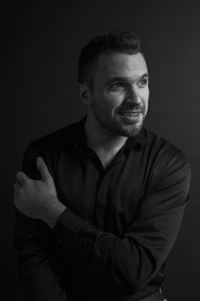 istock Black and White Emotional Portrait Young Man 1217970205