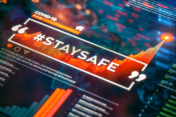 istock #staysafe. Stay safe hashtag close-up on digital display 1217972628