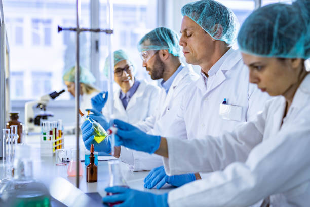 istock Group of scientist working in a laboratory. 1217973640