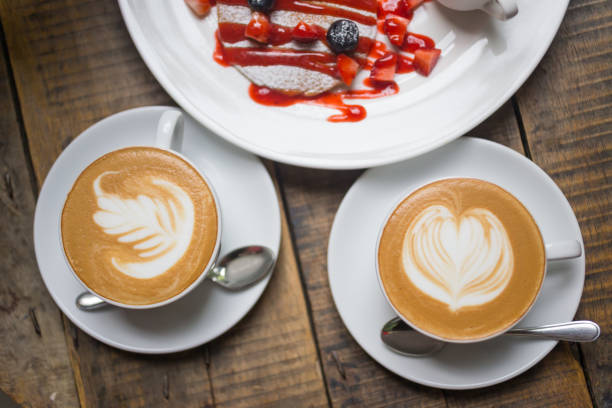 istock top view cappuccino coffee on wood table background 1217976229
