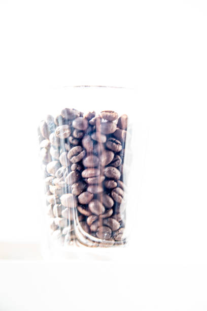 morning mood. coffee production. coffee trade. roasted coffee beans in a glass for breakfast