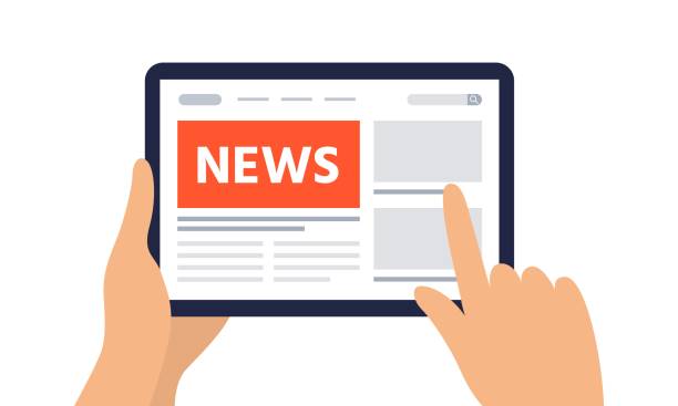 istock Reading news on a digital tablet. Tablet with newspaper, news site. 1217978903