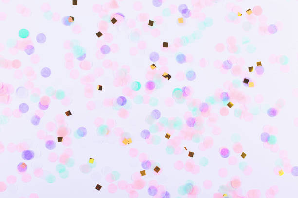 istock Colorful confetti on white background. Flatlay. 1217980859