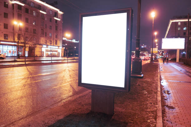istock vertical billboard on the edge of the road at night 1217982647