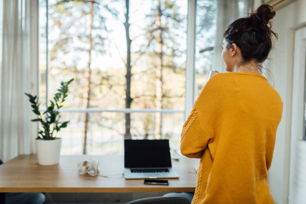 istock Young freelancer taking a break while working from home during Coronavirus pandemic 1217984898