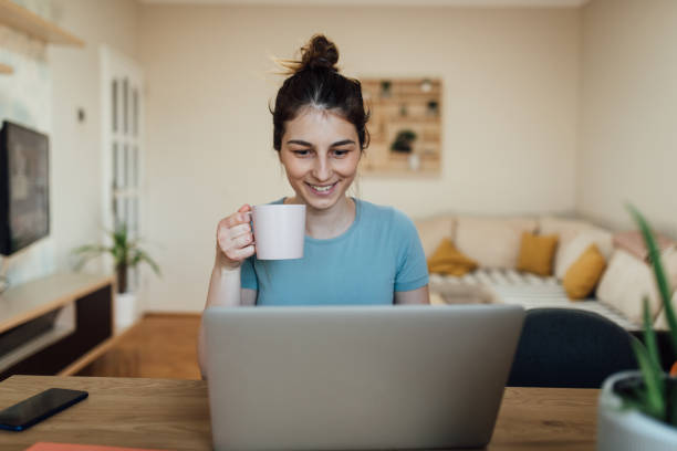 istock Young woman working from home due to Coronavirus lockdown 1217984937