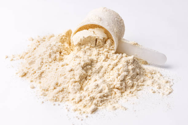istock heap of protein powder on white 1217986407
