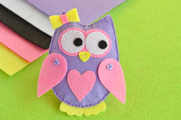 istock A cute felt owl toy. Felt sheets. Felt hand sewing projects for kids 1217988003