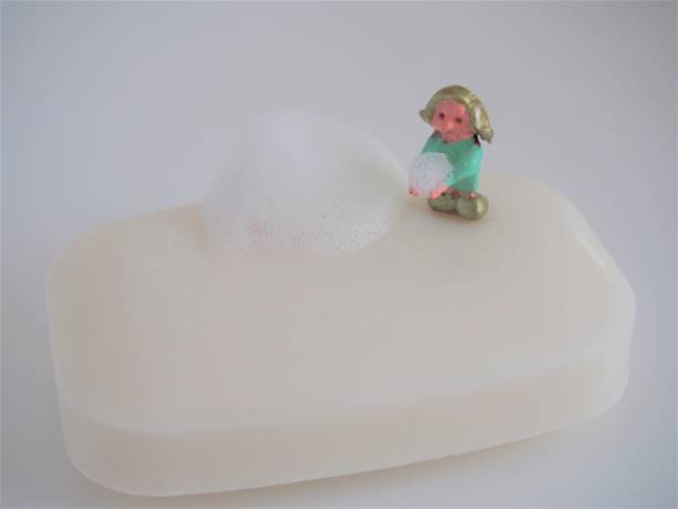 istock Girl washing hands (Soap and foam) 1217992817