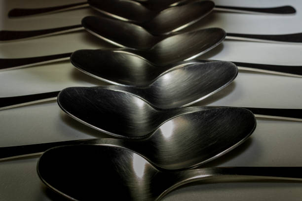 teaspoon top view with reflection isolated on white background