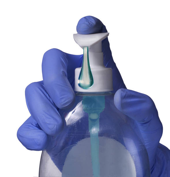 istock Medic hand hold liquid soap dispenser to disinfect. 1217997212