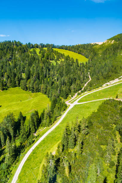 istock Alpine meadows in Dolomites mountains 1217998819