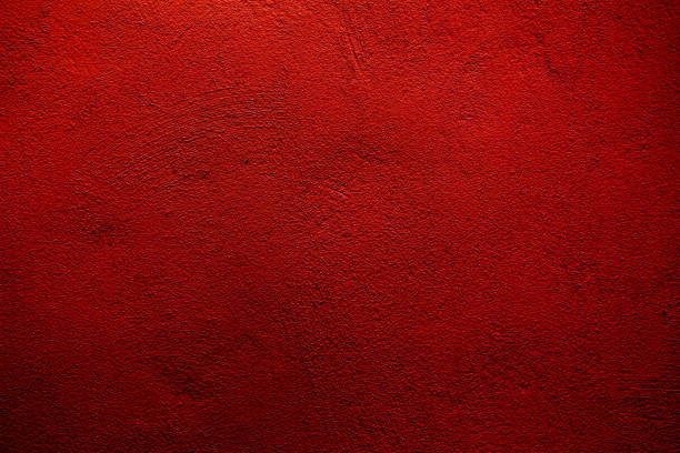 istock Red colored wall texture background with textures of different shades of red 1217998972