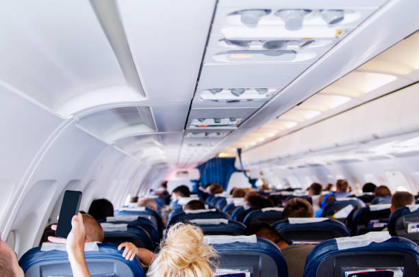 istock Unrecognizable Passangers in the plane 1217999007