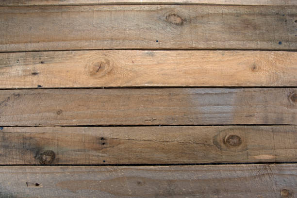 istock Rustic wooden planks background texture, brown 1217999499
