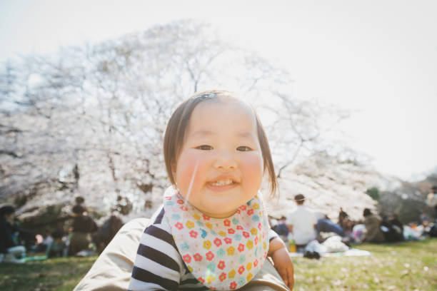 istock Father and baby relaxed in the park 1218000668
