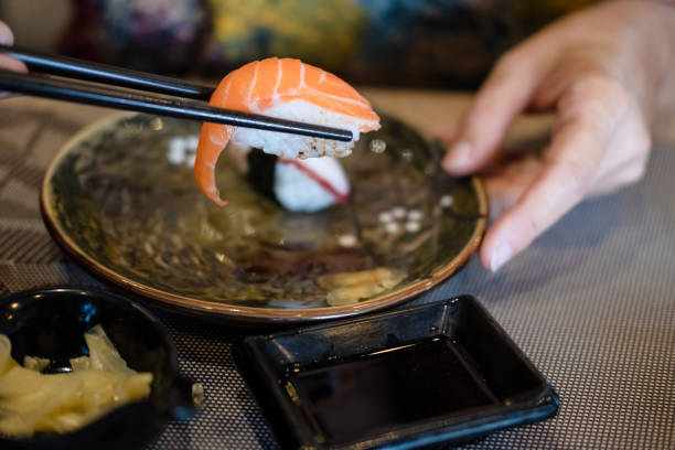 istock Eating Sushi at Home 1218001192
