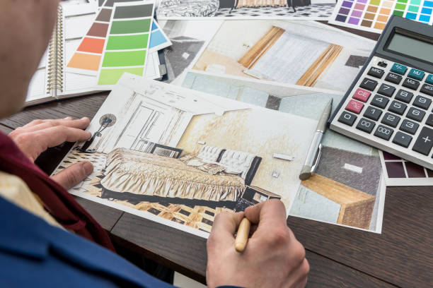 istock Designer working with home sketch and color sampler for modern interior. Archtercture project 1218002515
