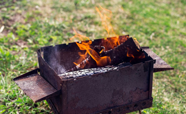 istock firewood burn in a barbecue outdoors in summer 1218006089