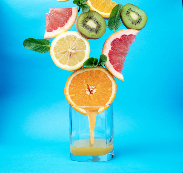 istock Citrus, orange, lemon, grapefruit, tangerine, lime on a blue background 1218006154