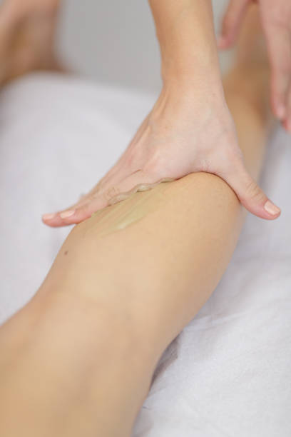 istock Hand massage therapy on patient's calves 1218007535
