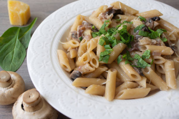 istock Vegan creamy mushroom garlic pasta garnished with basil 1218008249