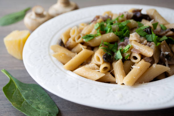 istock Vegan creamy mushroom garlic pasta garnished with basil 1218008283