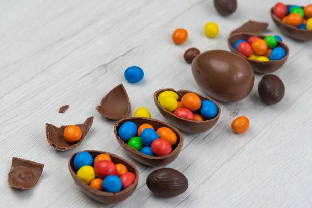 istock Chocolate Easter eggs and chocolate eggs filled with sweet and colorful candies 1218009168