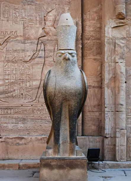 Ancient egyptian statue of falcon god Horus at the Temple of Edfu