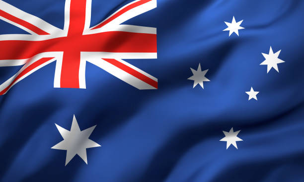 bandiera dell'australia che soffia nel vento - australian flag foto e immagini stock