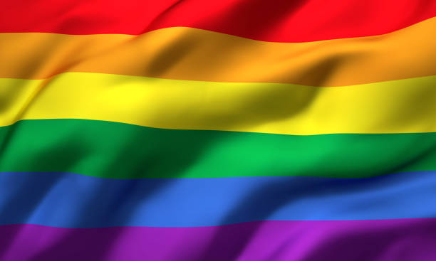 Rainbow flag blowing in the wind Rainbow flag blowing in the wind. Full page LGBT flying flag. 3D illustration. pride flag stock pictures, royalty-free photos & images