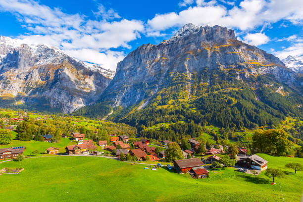 istock Grindelwald, Switzerland village and mountains view 1218011043